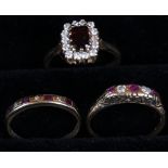 A gold and paste set dress ring stamped 375, a ruby and diamond ring,