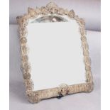 A late 19th century dressing table mirror, the arched,