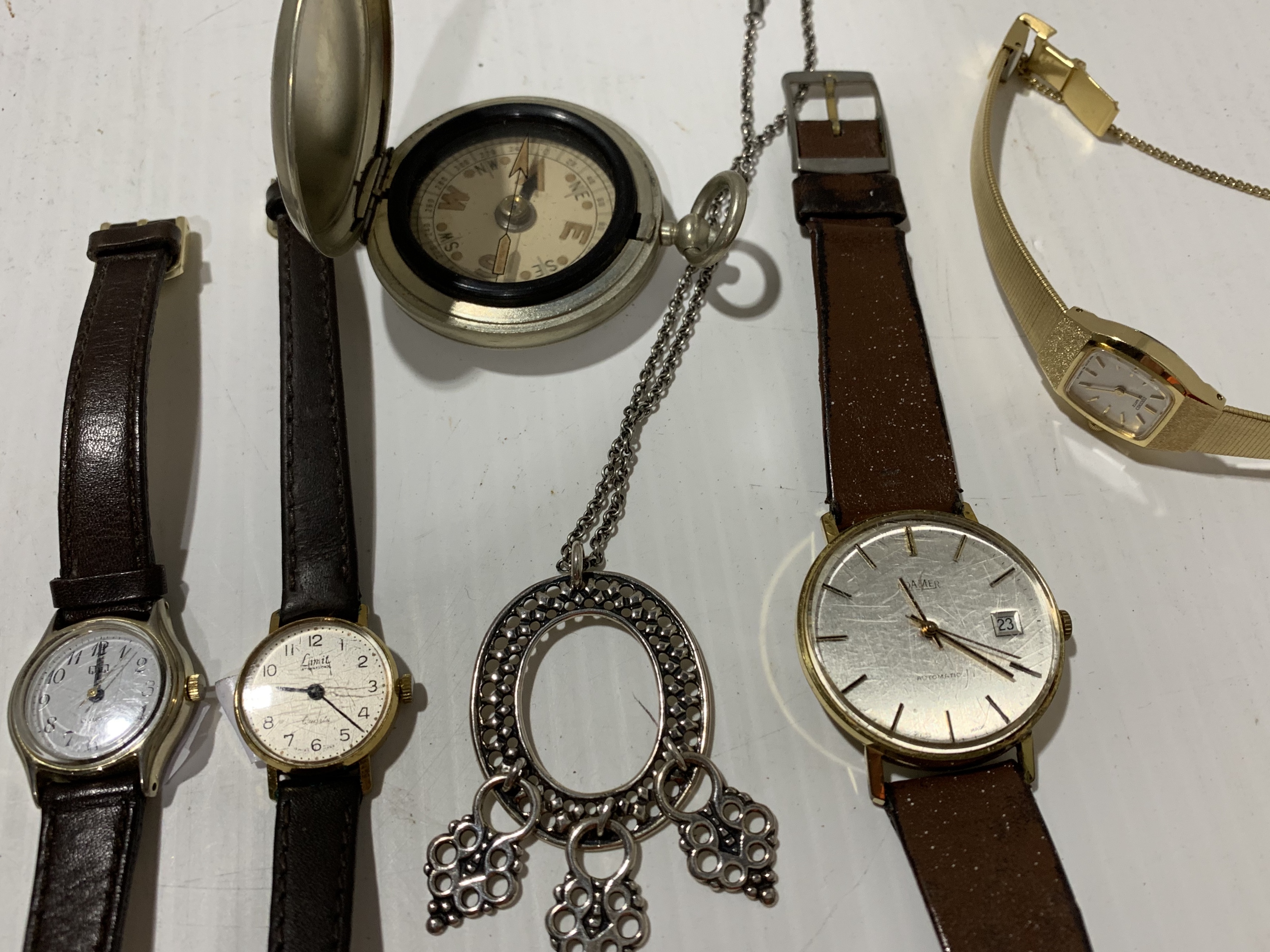 A gents Roamer wristwatch, a Seiko lady's wristwatch, two other watches,