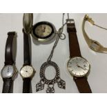 A gents Roamer wristwatch, a Seiko lady's wristwatch, two other watches,