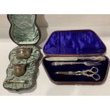 A cased silver sugar, cream and sugar tongs set, London 1882, together with a silver serving set,