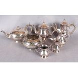 A Victorian three piece tea service, of circular form,