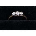 A three tone diamond engagement ring,