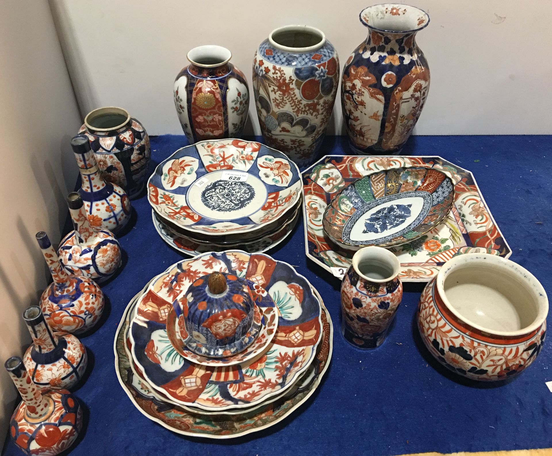 A collection of Japanese Imari porcelain, including bowl, plates, vases,