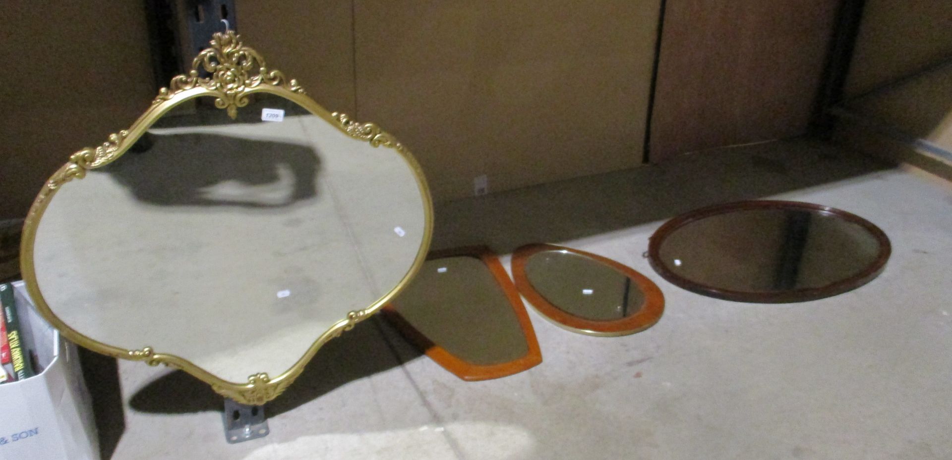 A gilt framed wall mirror,