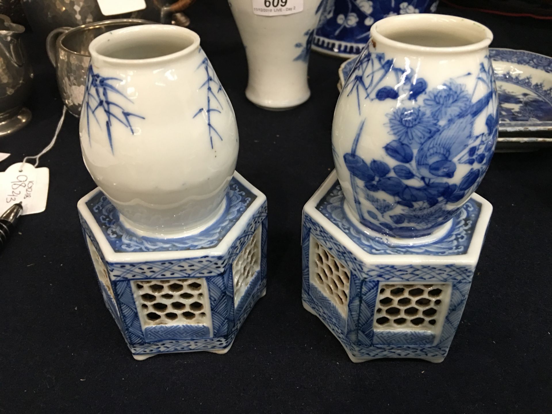 A pair of Japanese blue and white porcelain vases, each on a reticulated hexagonal section base, - Image 4 of 12