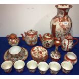 A small collection of Japanese Kutani porcelain teawares and ornamental items