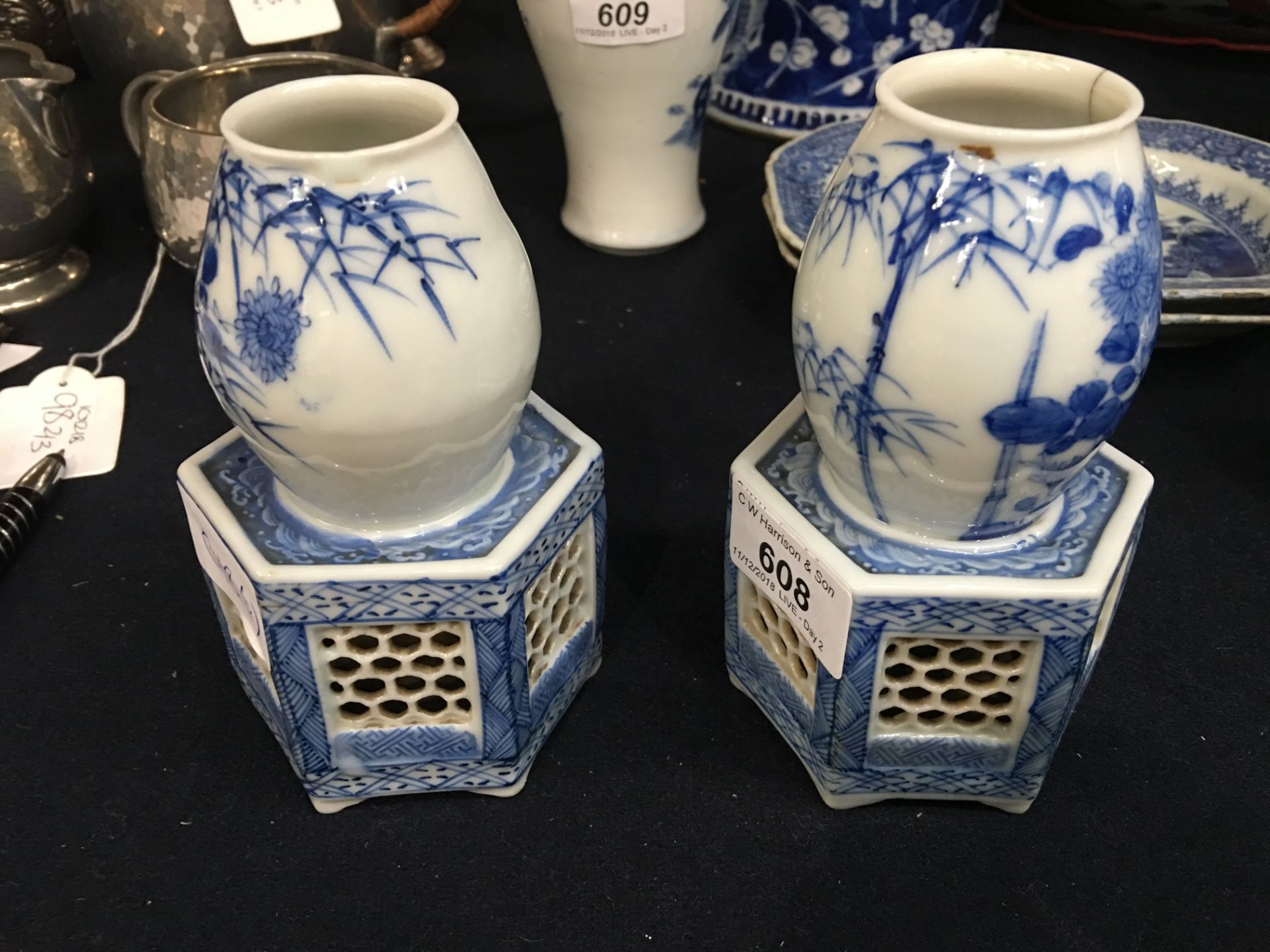 A pair of Japanese blue and white porcelain vases, each on a reticulated hexagonal section base, - Image 3 of 12