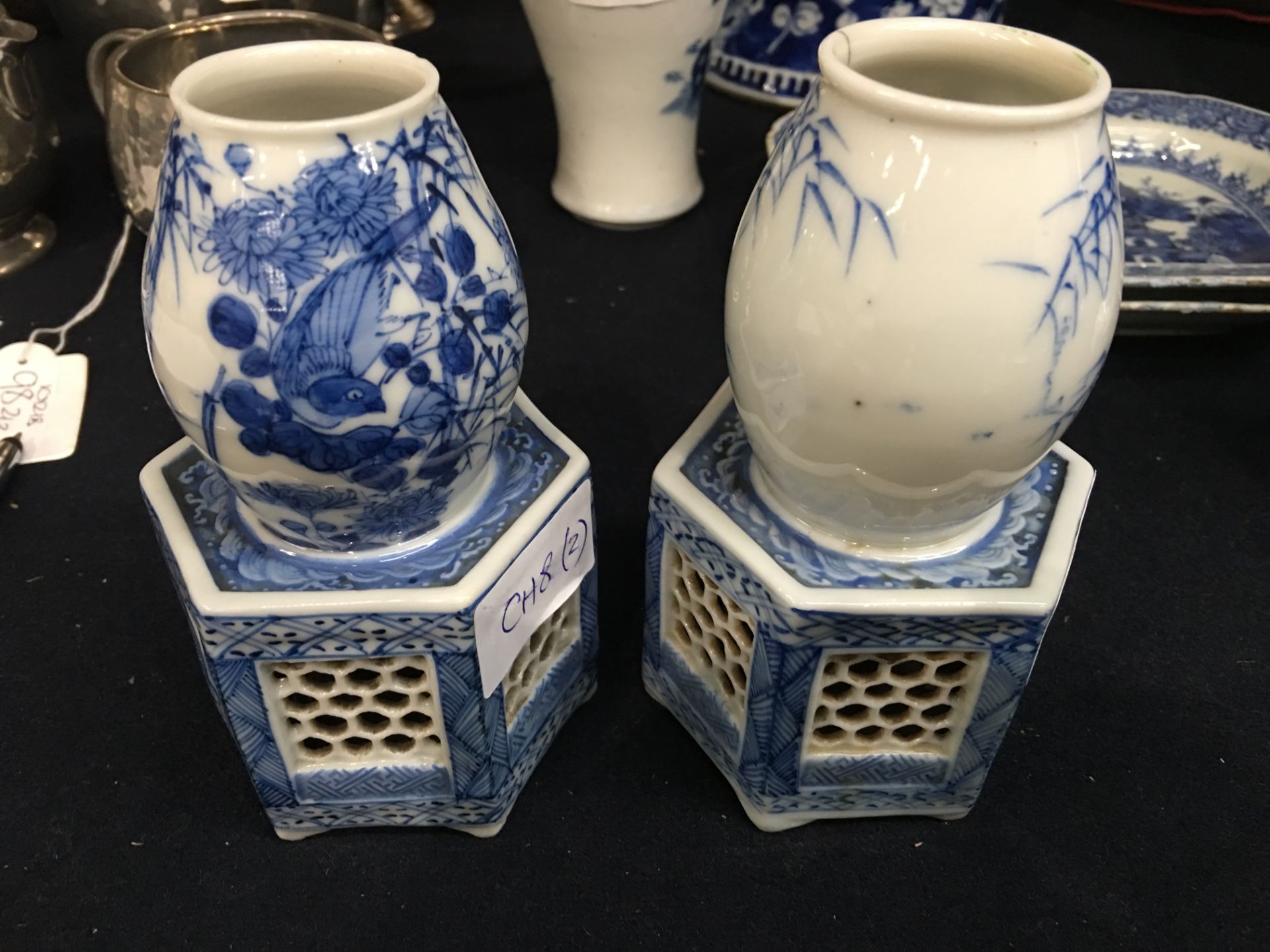 A pair of Japanese blue and white porcelain vases, each on a reticulated hexagonal section base, - Image 7 of 12