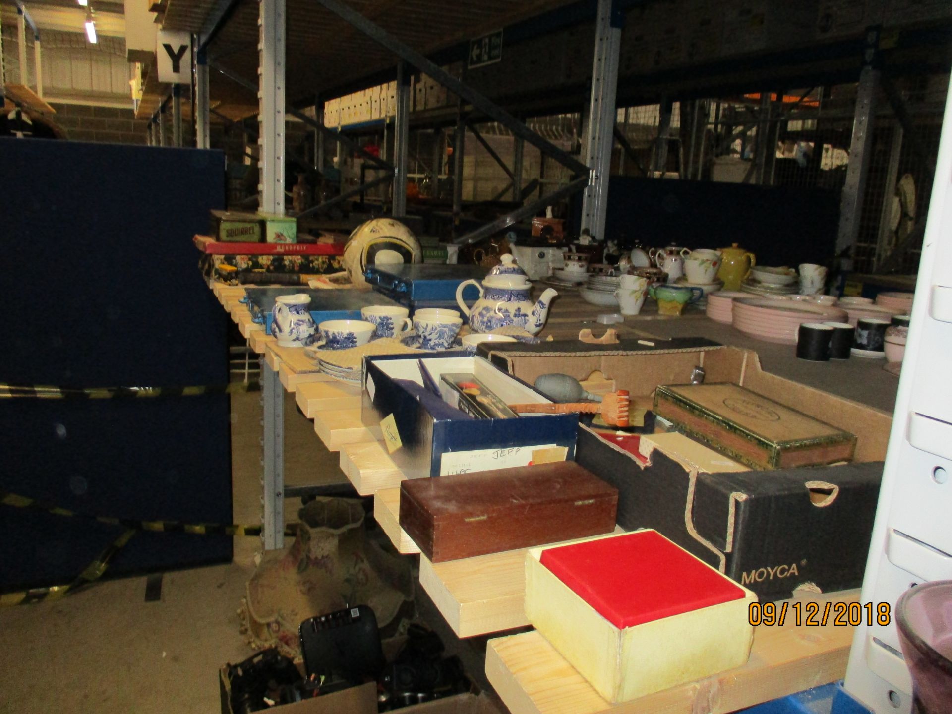 Contents to part rack - games, football, three tins of screws, blue and white ware,
