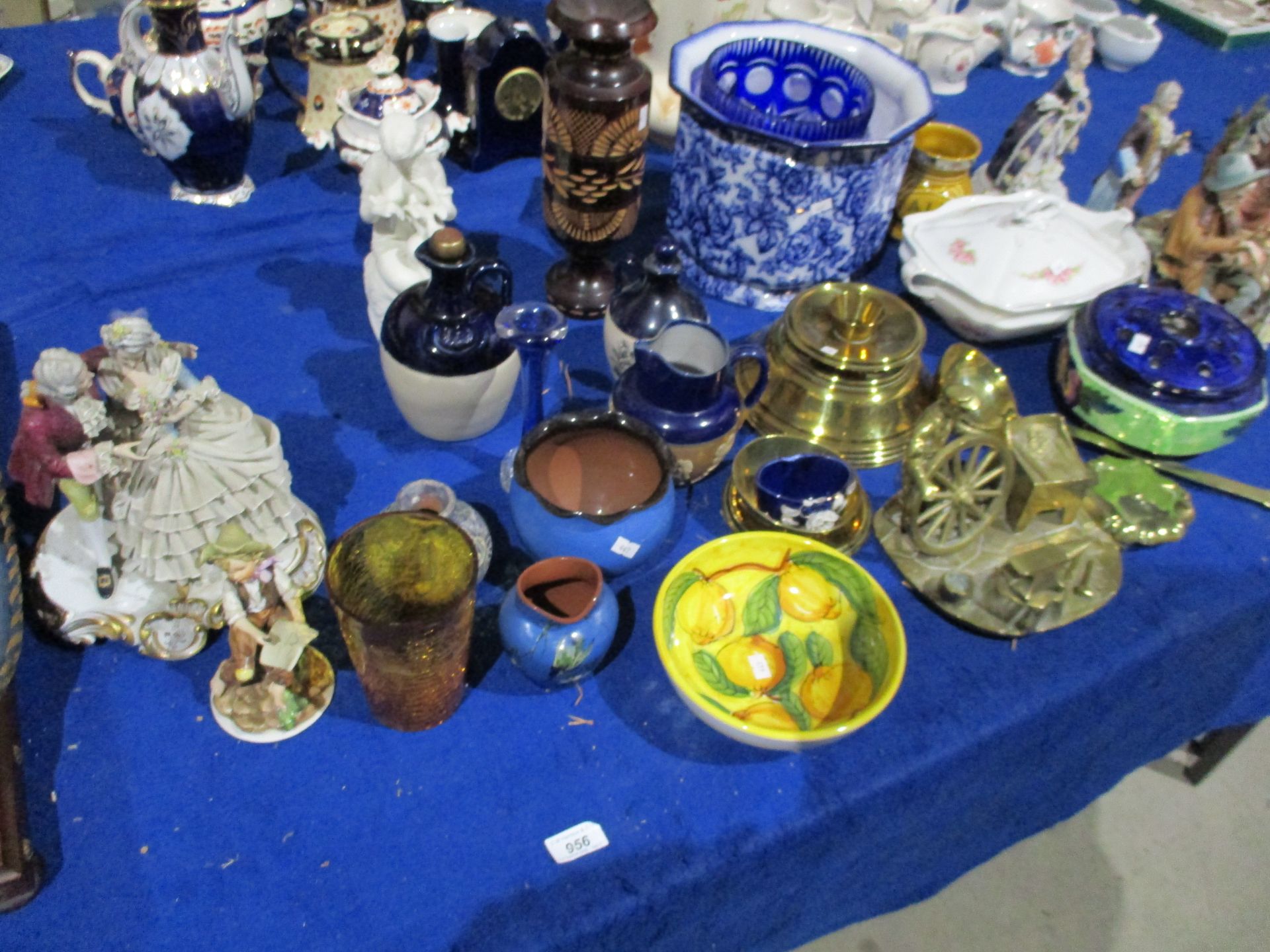 Collection of brassware, Capo-Di-Monte figurines, blue glazed pot, stoneware jars,