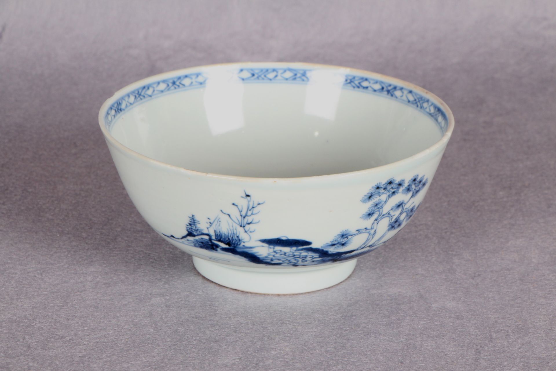 A Chinese blue and white porcelain bowl, painted with the Scholar on a Bridge pattern,