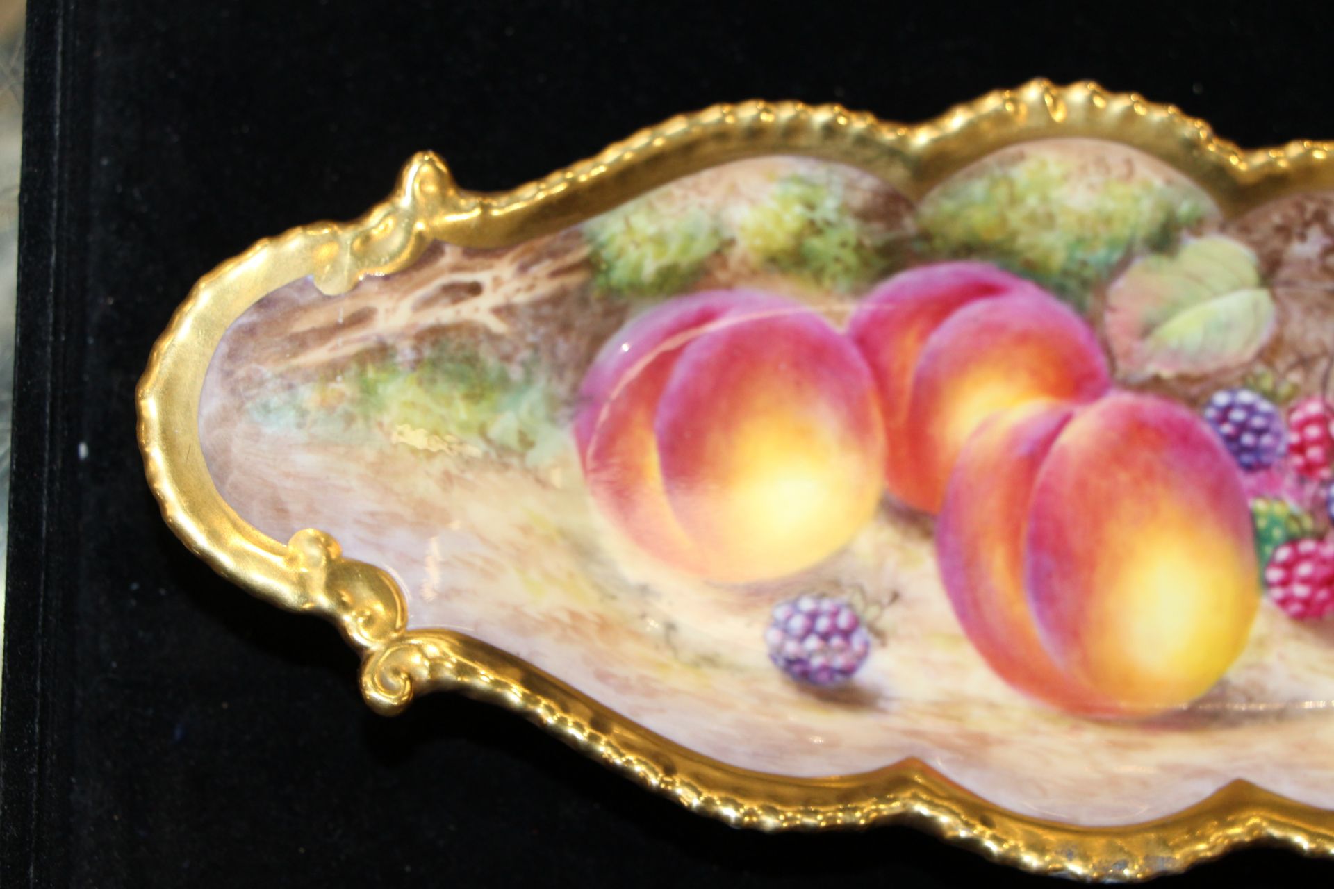 A Royal Worcester oval shaped edged dish painted with fruit, signed J. - Image 4 of 12