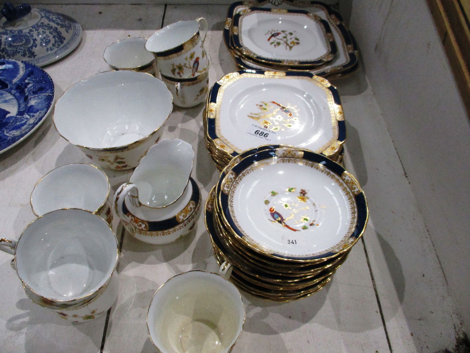 Contents to part of cabinet - 33 pieces of Tuscan china bird patterned tea service