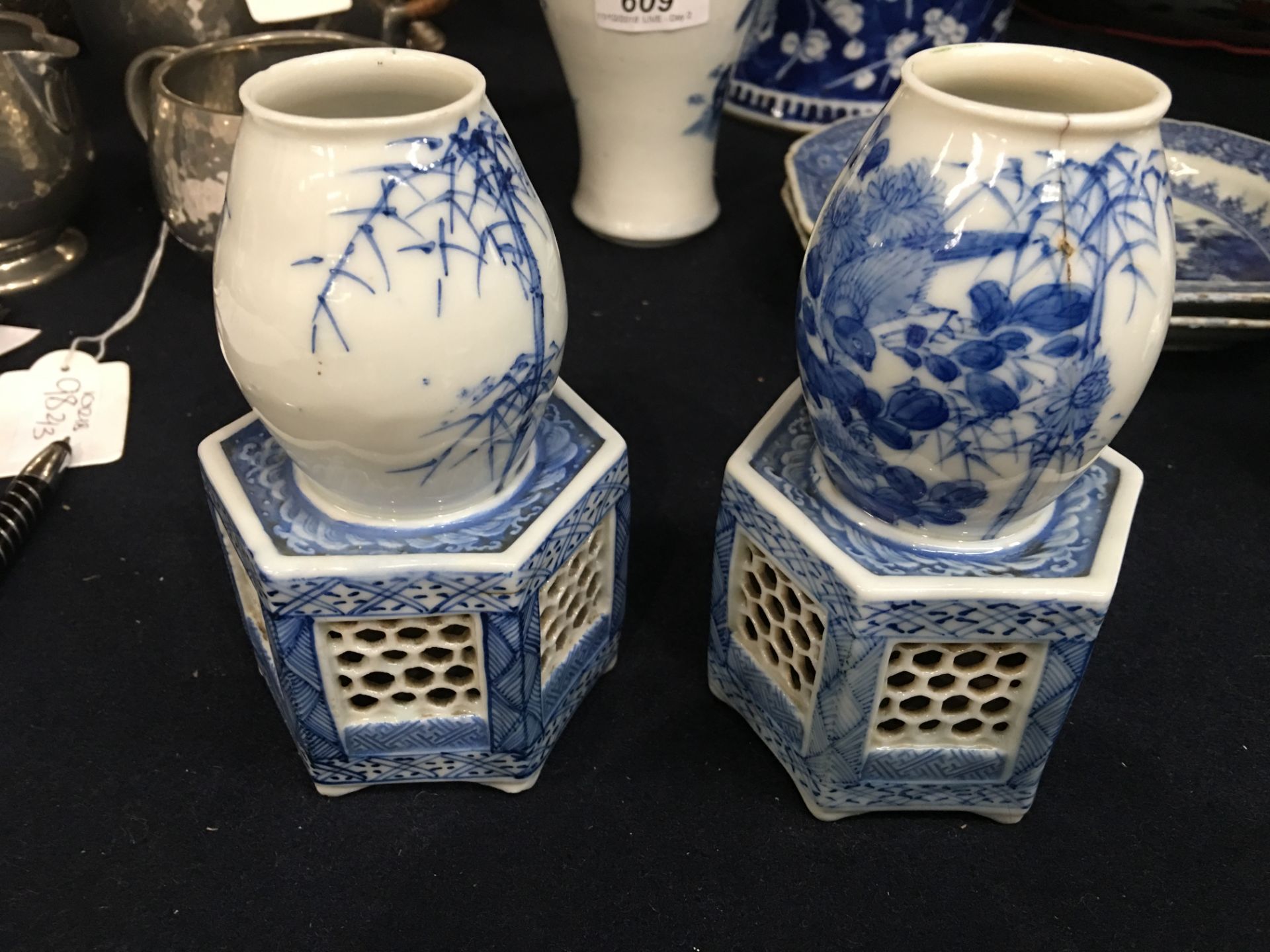 A pair of Japanese blue and white porcelain vases, each on a reticulated hexagonal section base, - Image 5 of 12