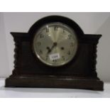 Ebonised mantel clock with turned supports 12"