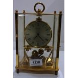 Kundo Quartz clock in glass case