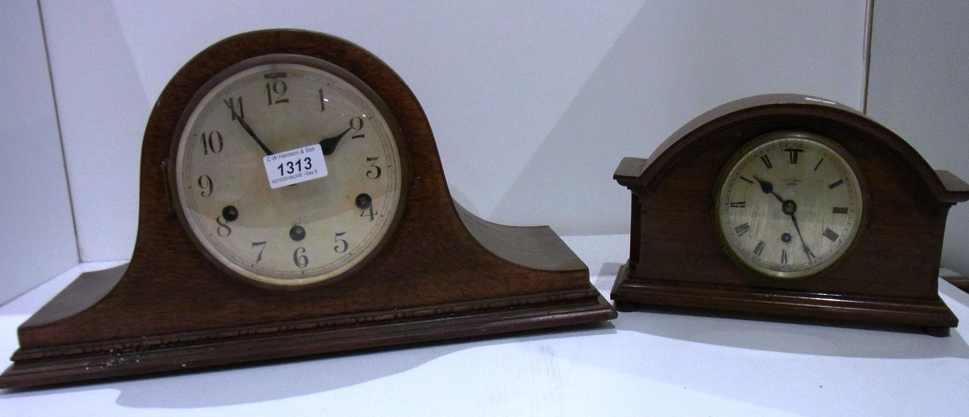 Napoleon hat month clock and another by A & J Bell of Leeds