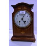 Mahogany capula topped mantel clock with satinwood stringing,