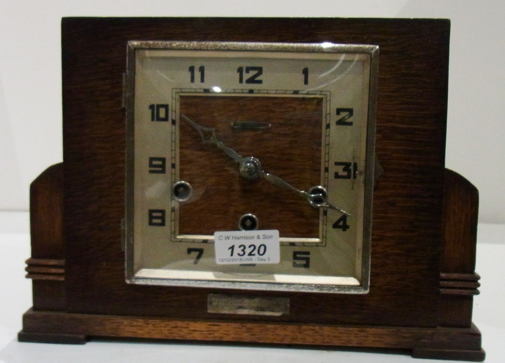 Rectangular oak cased mantel clock 8" with inscribed plaque 1945,