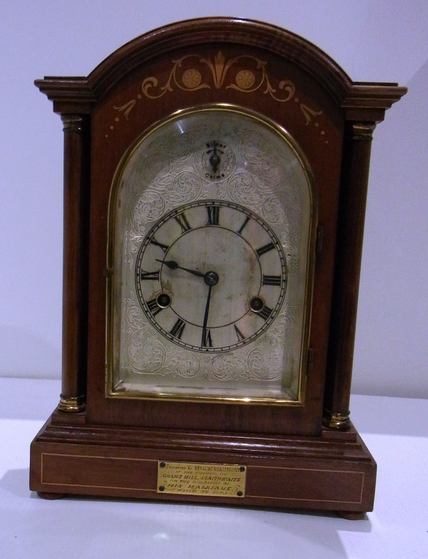 Walnut cased cupola topped silent/chime pilastered mantel clock presented to C. W.