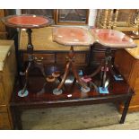 A mahogany coffee table plus three tripod tables