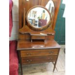 A Edwardian inlaid mahogany and cross banded two piece bedroom suite comprising a dressing table