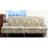 A Victorian style country house four seater settee on turned legs