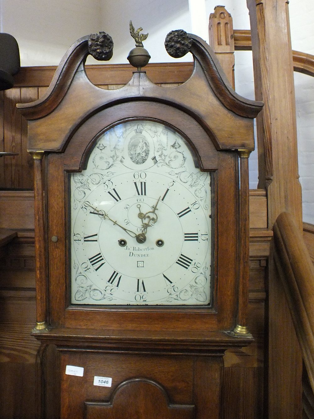 A 19th Century oak 8 day long cased clock by Jas Robertson,