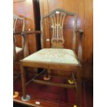 A set of six mahogany Chippendale style dining chairs