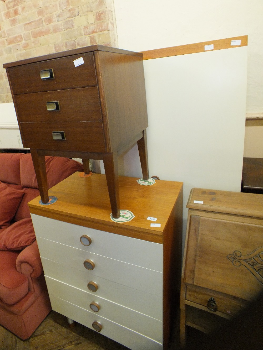 A modern two piece bedroom suite and a bedside chest