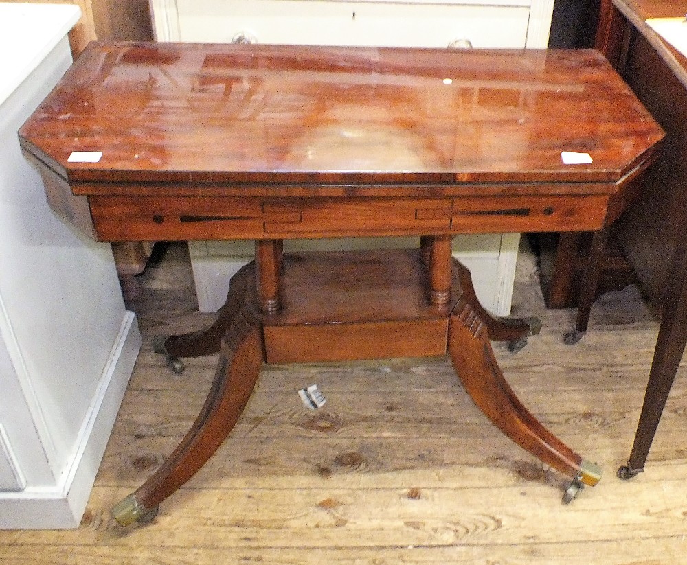 A 19th Century mahogany folding card table on splayed legs