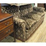 A Victorian three seater settee and armchair in brown velour