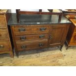 An oak and black marble top washstand
