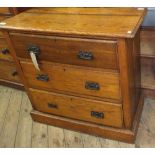 An oak chest of three drawers with Art Nouveau handles