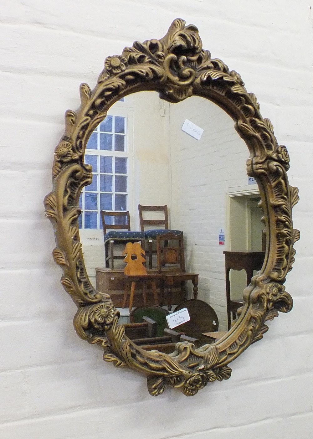 A pair of gilt wall mirrors