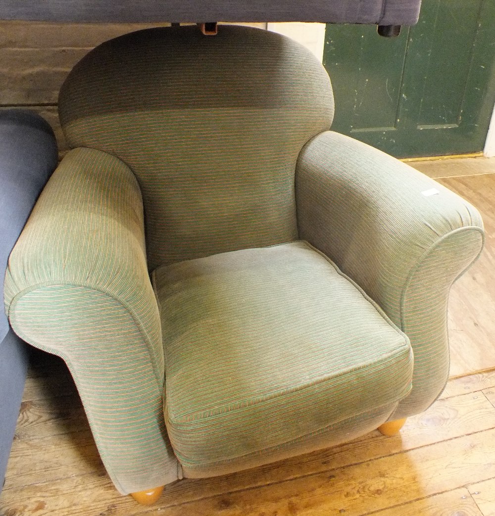 A modern green and pink pin stripe upholstered armchair