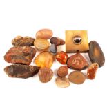 A tigers eye gilt box plus a collection of agate stones