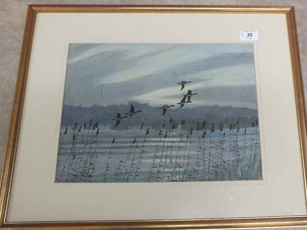 A pair of oils on canvas of ducks in flight, indistinctly signed,