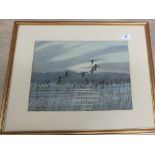 A pair of oils on canvas of ducks in flight, indistinctly signed,