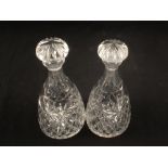 A pair of cut glass decanters