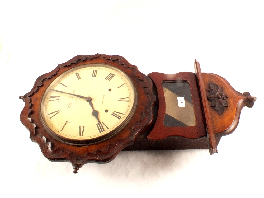 A 19th Century Seth Thomas carved mahogany drop dial clock