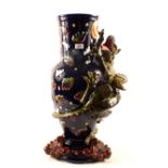 A large majolica blue ground vase with applied gryphon decoration,