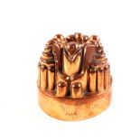 A Victorian circular copper jelly mould of turret form and stamped '371',