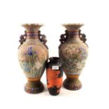 A pair of 19th Century Japanese floral vases plus a black lacquer vase (as found)