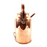 An early 20th Century copper water carrier with lid and swing and fixed handles,