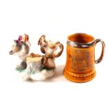 A continental porcelain bear inkwell plus a golfing mug