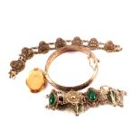 A mixed lot of jewellery including a silver bangle,