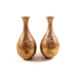 A pair of Japanese brass vases with bi-metal decoration,