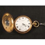 A gents 9ct gold half Hunter pocket watch (initials and light dents to rear,